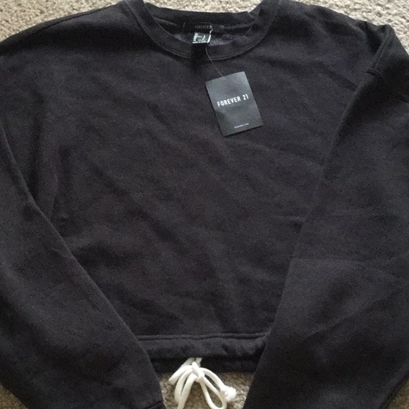 Forever 21 Sweaters - Black drawstring cropped sweatshirt